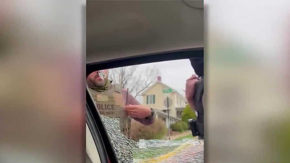 Woman in ICE custody after officer breaks window during arrest