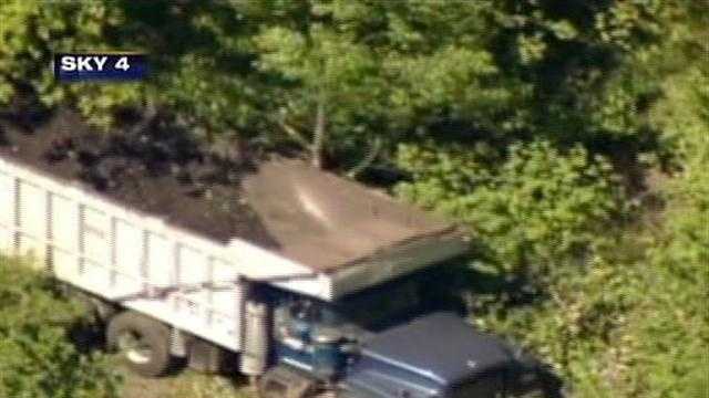 Dump truck goes off road in Penn Township