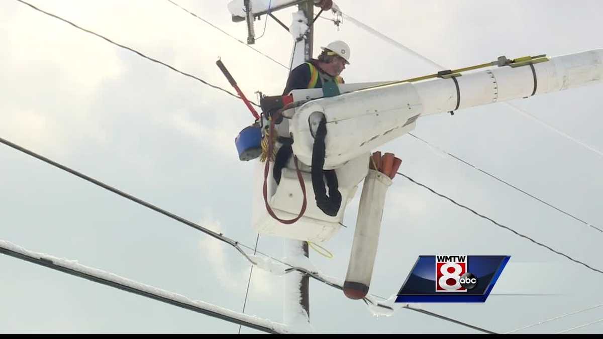 Crews work to restore power, clean up roads after winter storm
