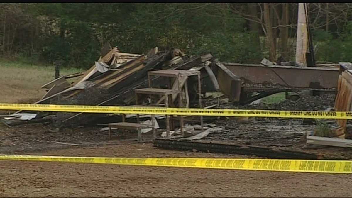 Woman found dead in burning mobile home