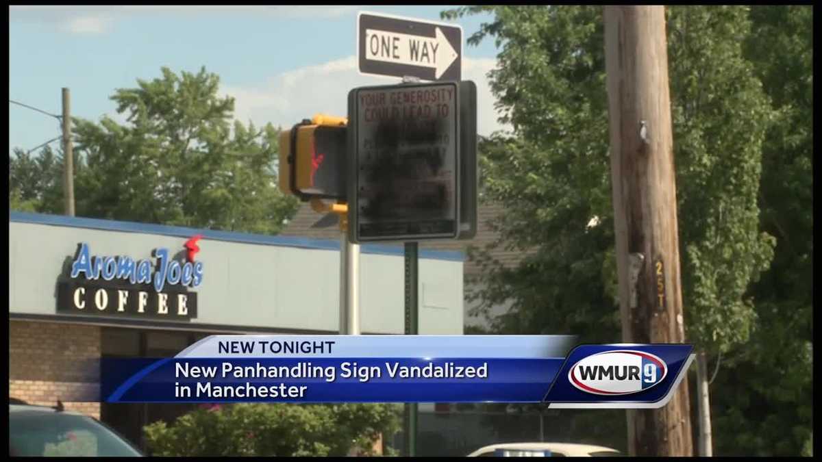 New panhandling sign spray painted in Manchester