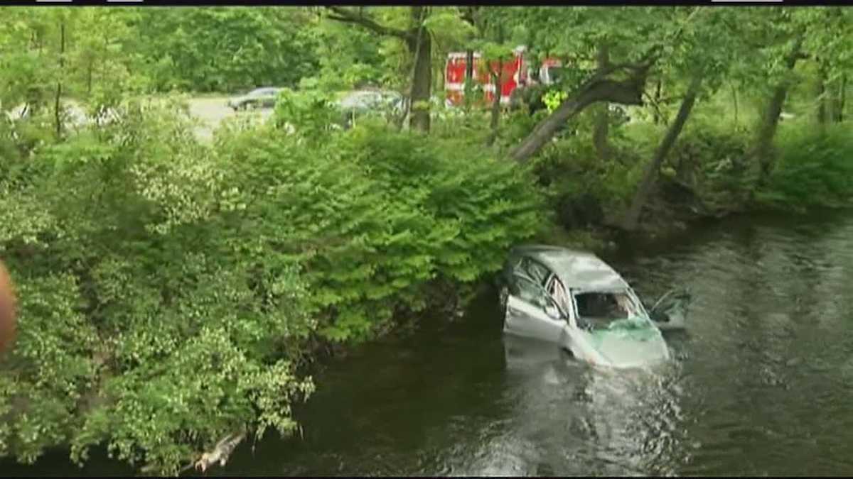 Elderly couple pulled from submerged car in river