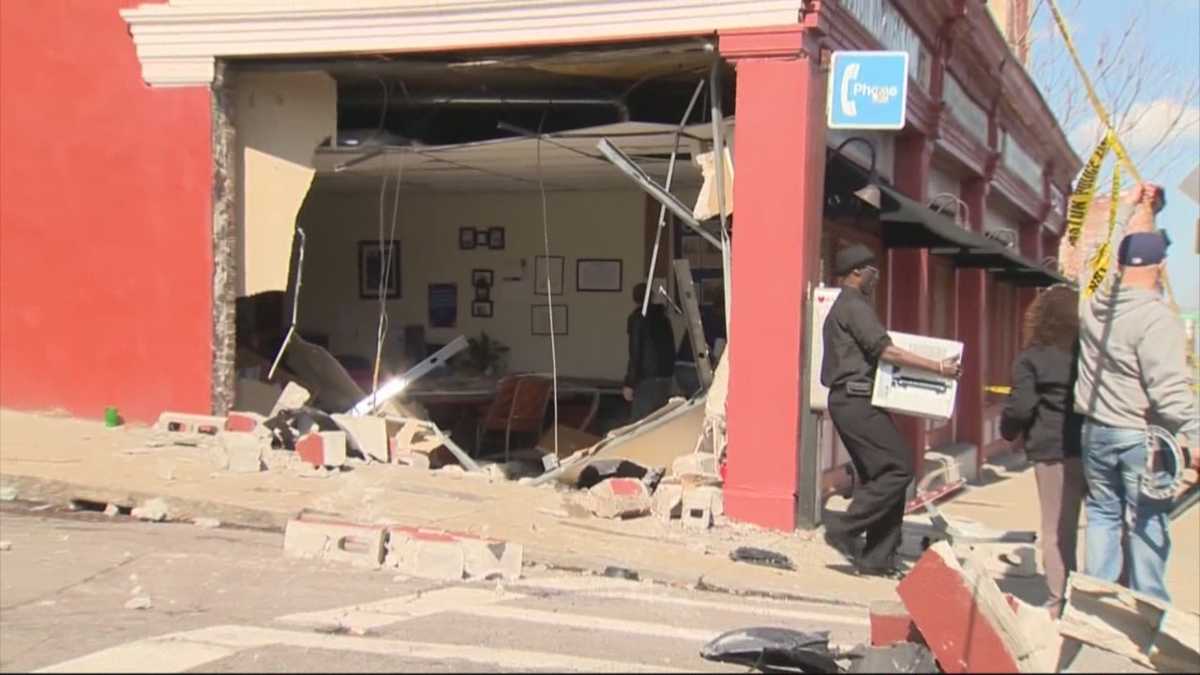 Driver crashes into building after shots fired