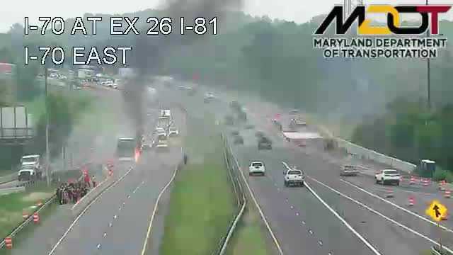 Charter bus catches fire after tire blew out
