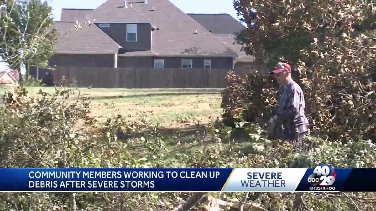 Families clean up debris after severe storms