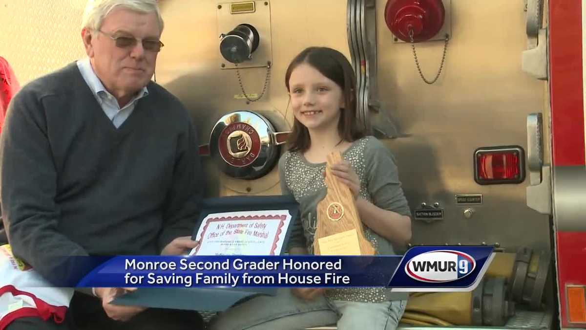 Monroe child honored for saving family from house fire