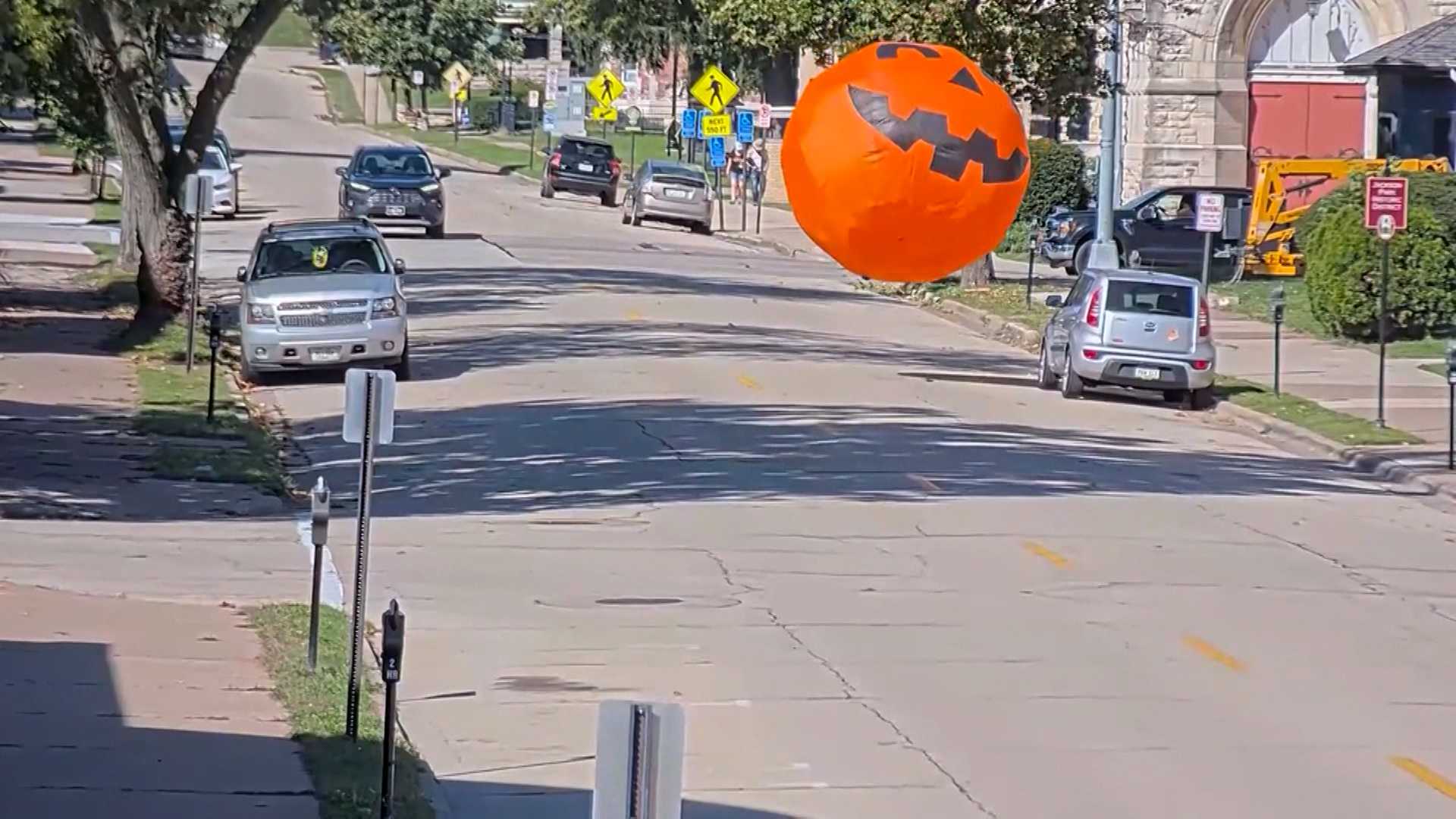 WATCH: Giant inflatable pumpkin goes rogue in downtown Iowa town, sending driver swerving