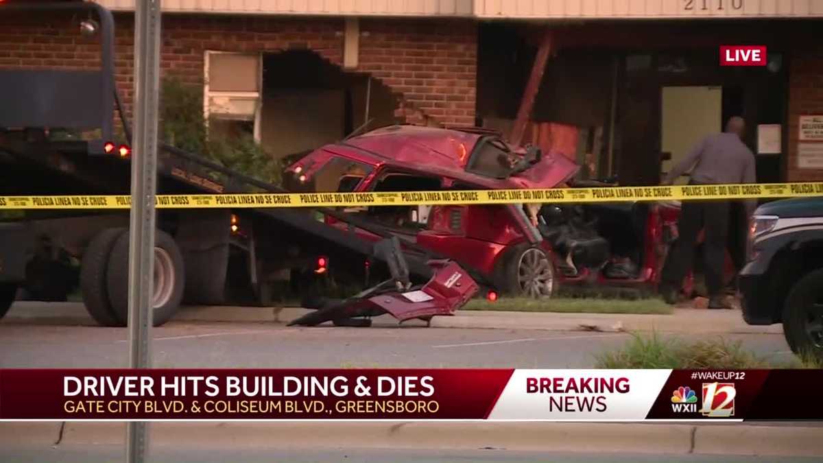 Man killed after car crashes into a Greensboro office building