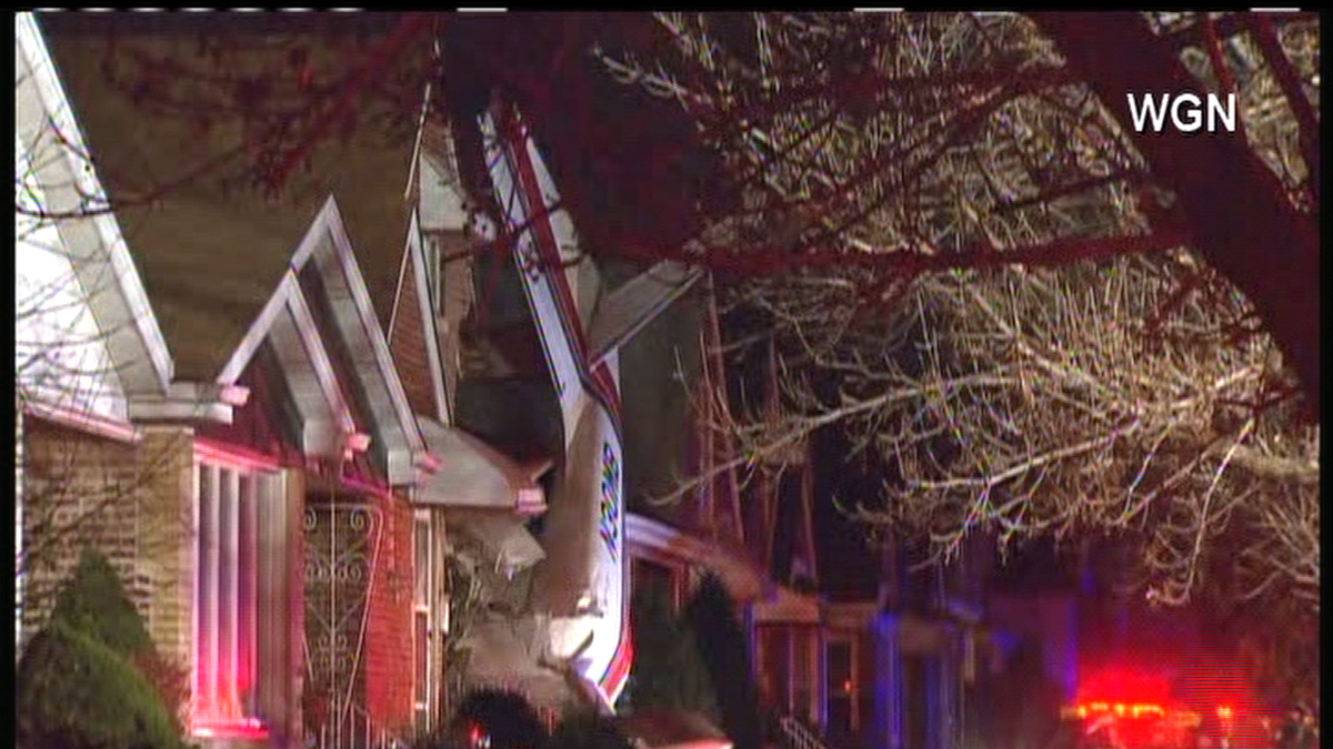 Plane Crashes Into House Near Midway