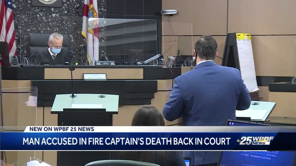 Man accused in fire captain's death in court
