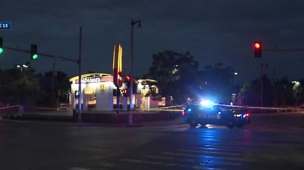 Man charged with shooting woman in McDonald's parking lot
