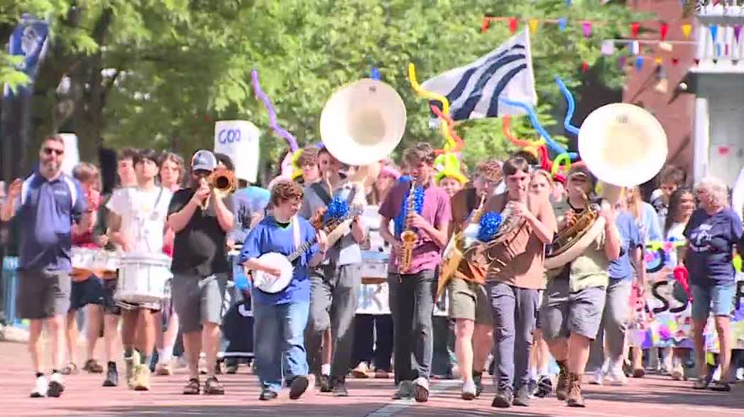 Burlington High School students say goodbye to former Macy’s building with parad...
