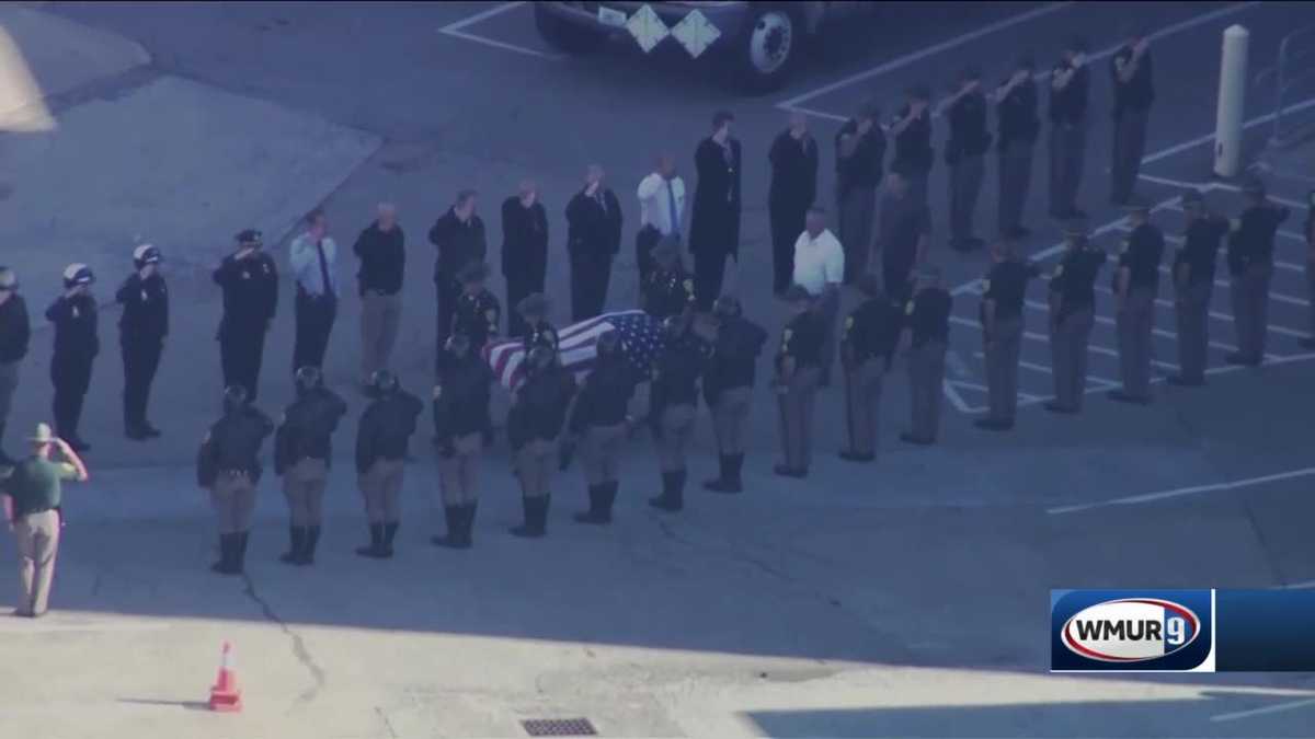 Police procession escorts body of fallen trooper to Dover funeral home