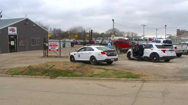 Police: Car drove through parking lot gate, injuring bystander - Vimarsana News