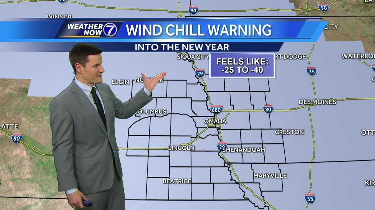 Scattered snow showers overnight, dangerous cold stays put into the New