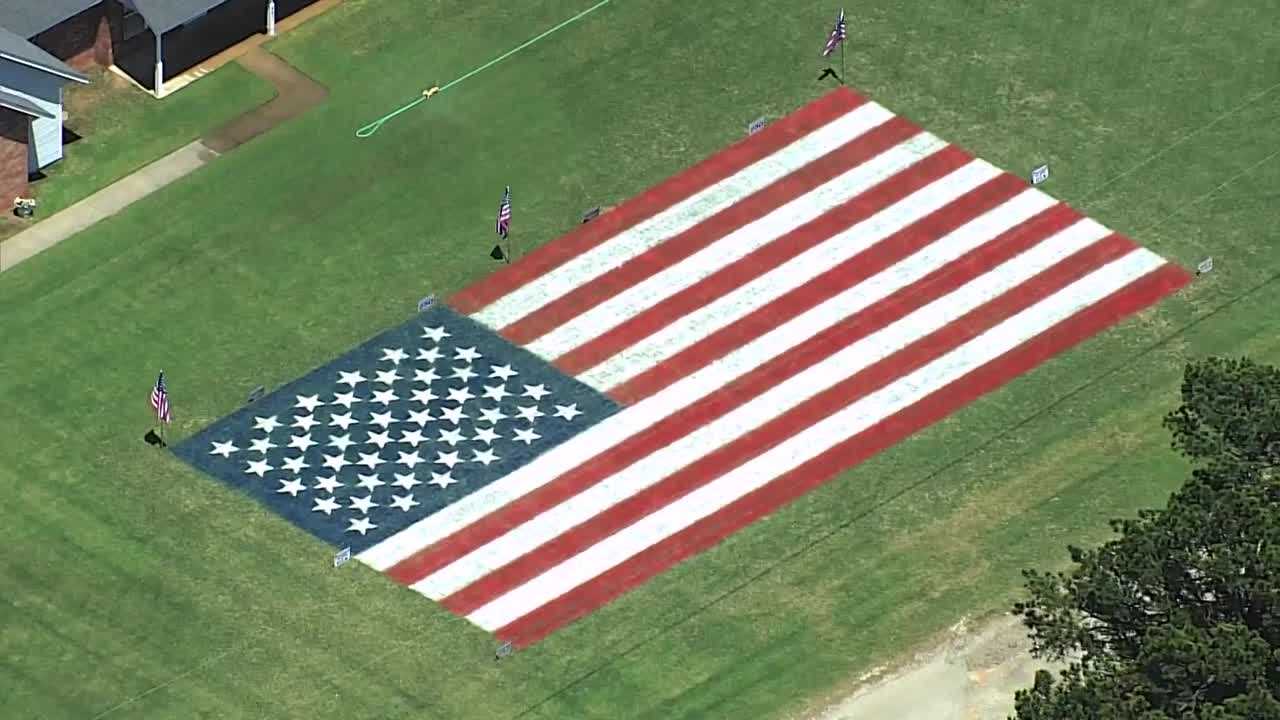AERIAL FOOTAGE: Oklahoma family paints American flag in yard to celebrate 250 years of independence