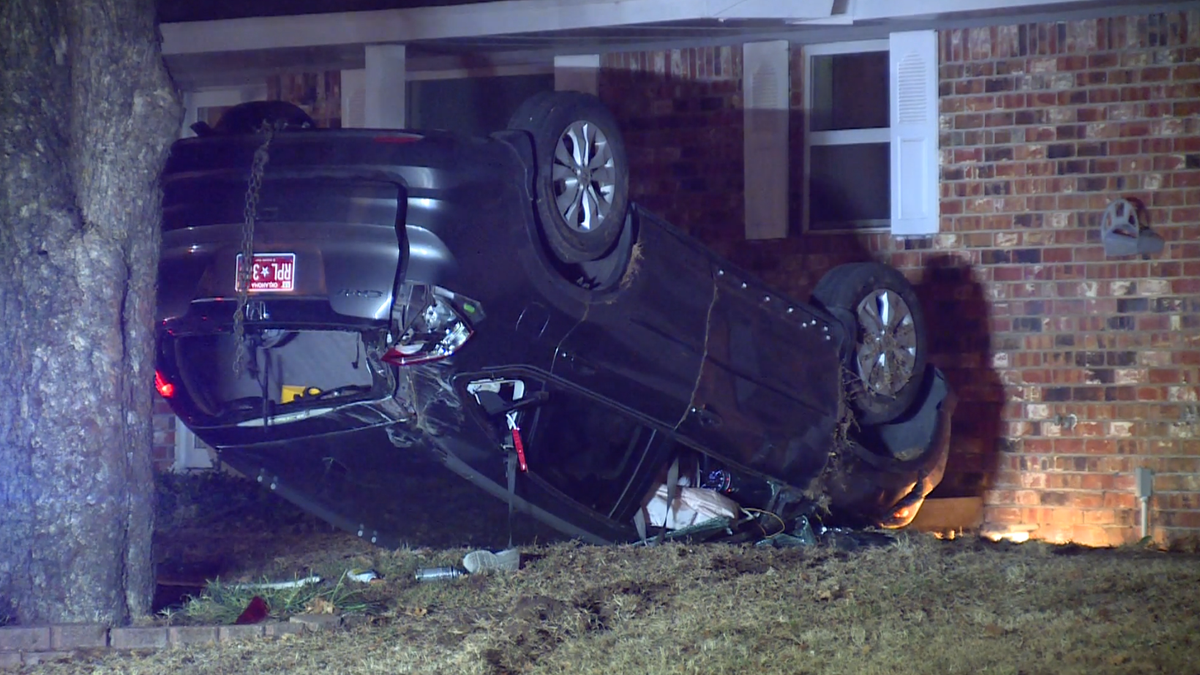 OKC Police: Driver flees scene after car almost flips into home
