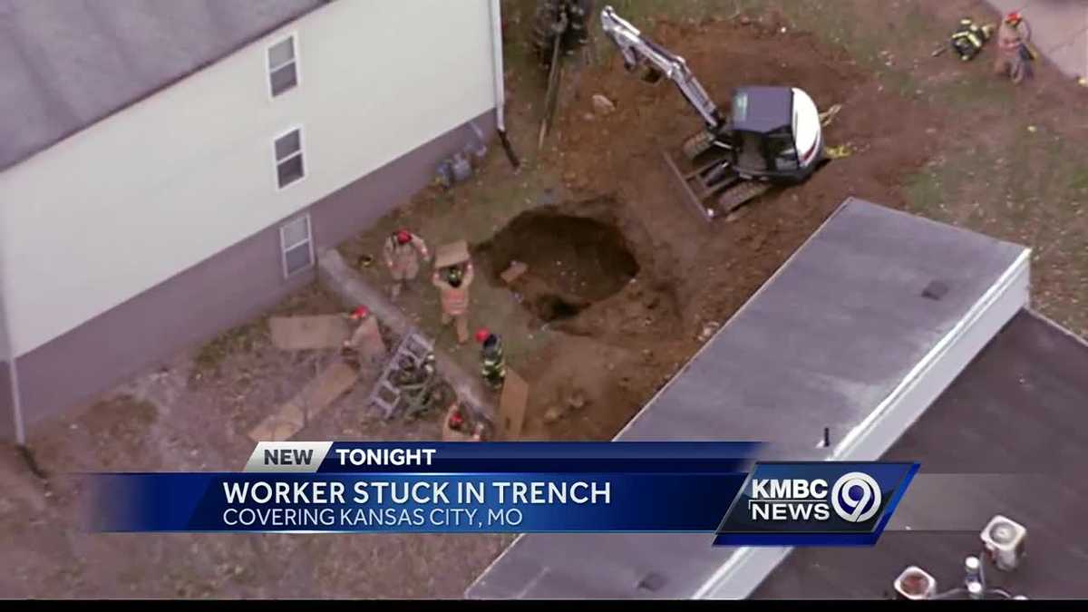 Worker freed after being trapped in trench