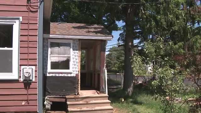 Three people arrested in connection to body buried in Concord backyard, officials say