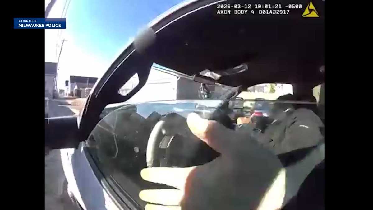 WATCH: Body camera shows Milwaukee officer hang from moving truck before deadly shooting