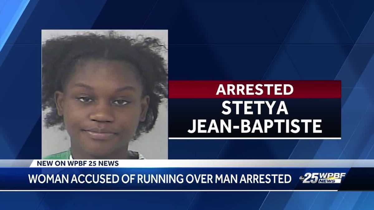 Woman accused of running over man arrested