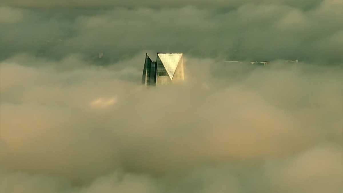 Sky 5 shows top of Devon Tower through low cloud coverage