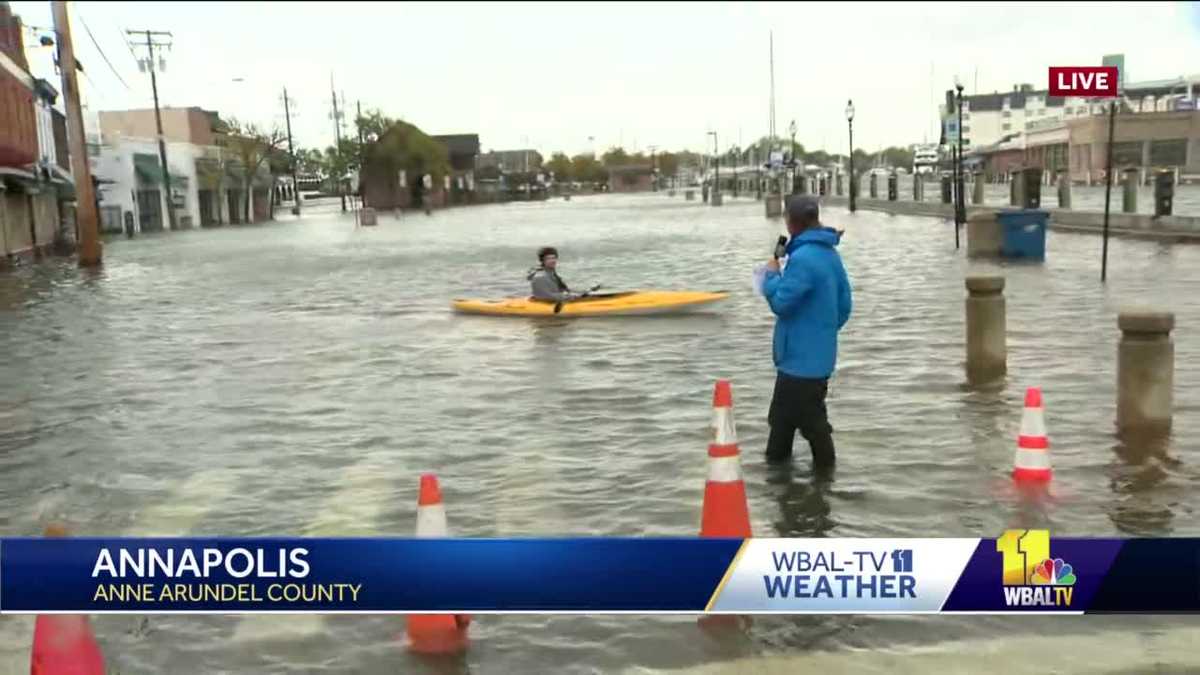 Kayakers paddle through flooding on Annapolis Main Street
