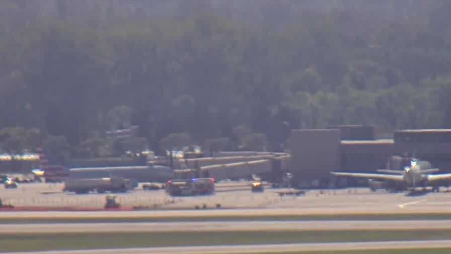 Firefighters, paramedics preparing for plane with smoke in cockpit to land at Eppley Airfield