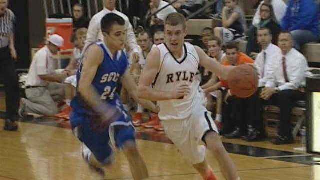 Ryle holds off Scott, wins season opener