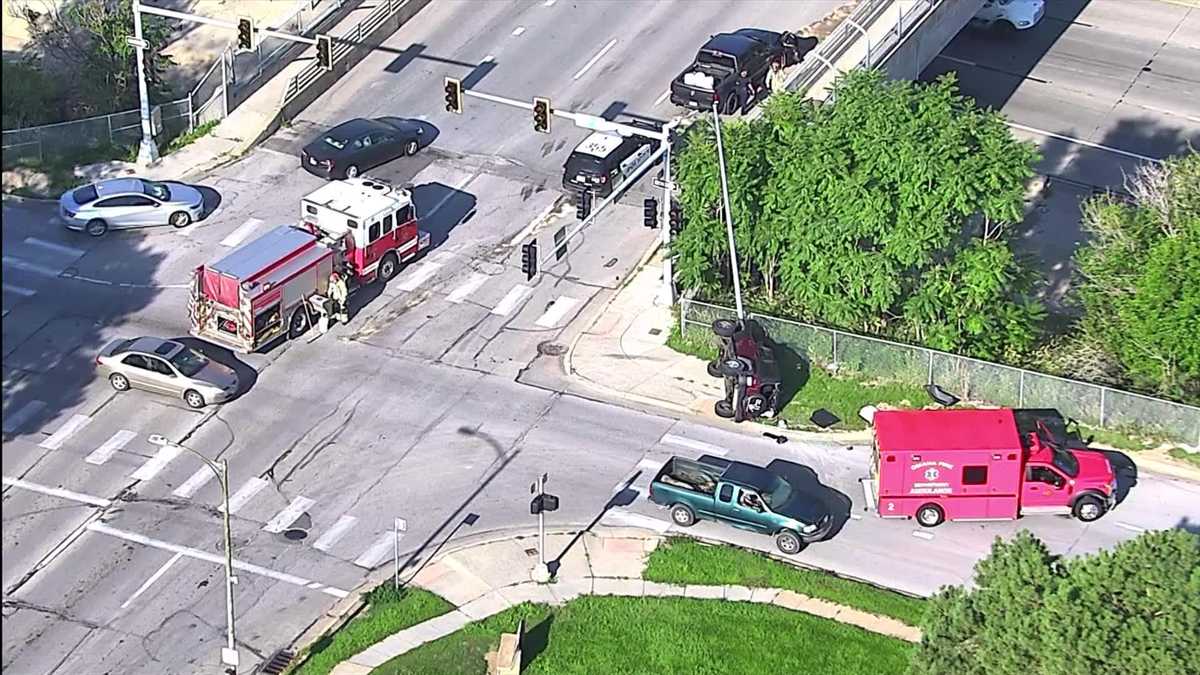 Omaha crash causes vehicle to flip on its side