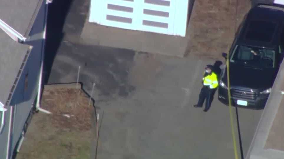 Man shot by police after woman found dead at Wakefield home, DA says