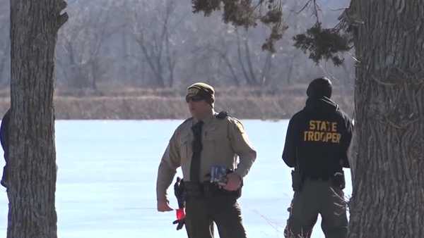 officials identify body found near amana lily lake, suspect charged with kidnapping