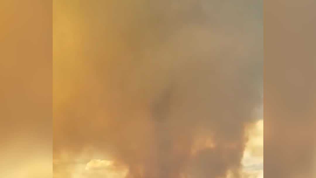 A rare fire tornado is spotted near a blaze in California
