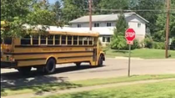 Raw video: School bus runs stop sign in Springdale