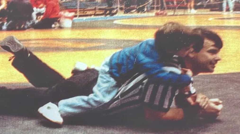 Iowa father-son referee duo pin down lifelong dream on wrestling mat