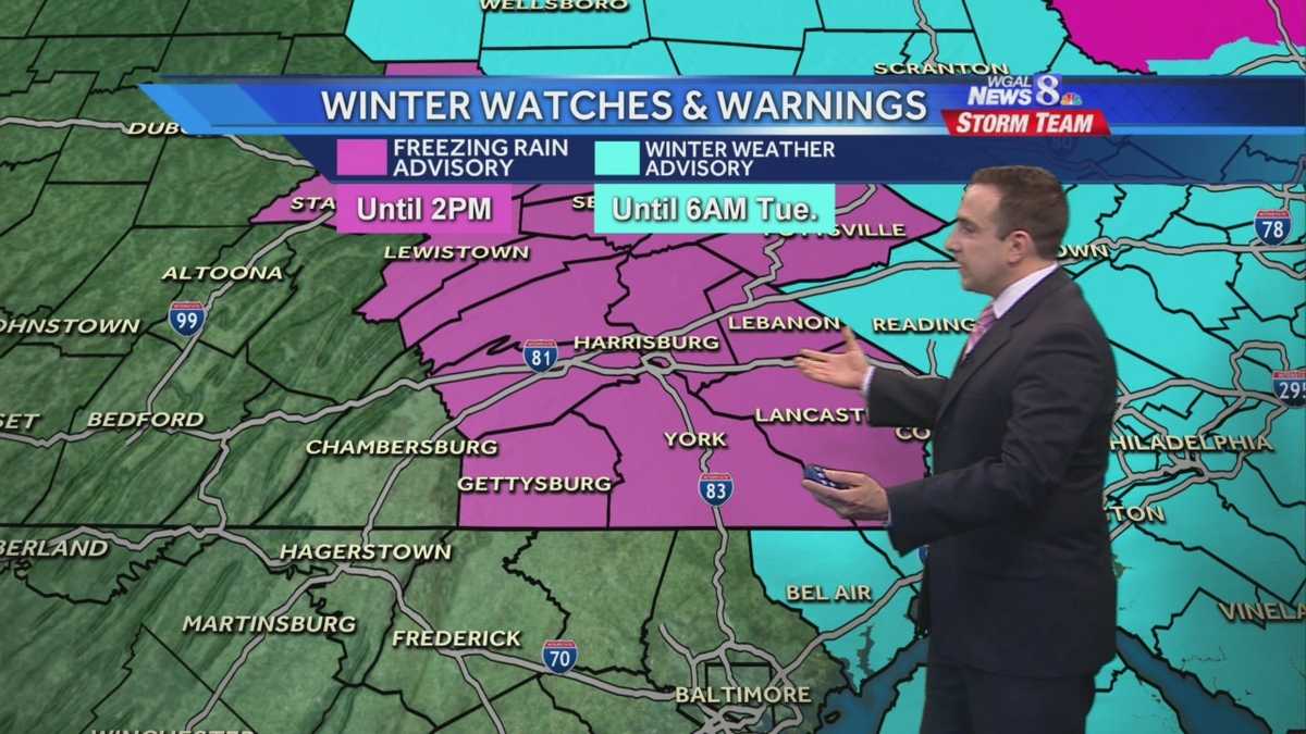 Freezing rain, scattered snow showers in some areas