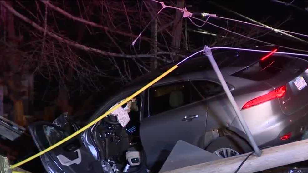 Car rips down wires, lands on other vehicle in crash