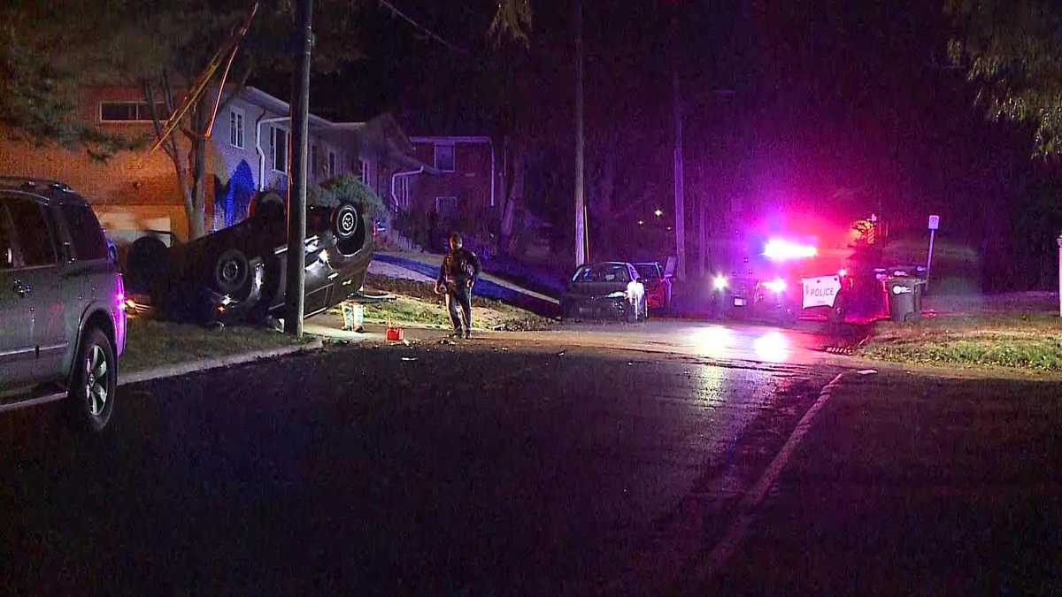 Car flips, brings down live power lines in Omaha crash