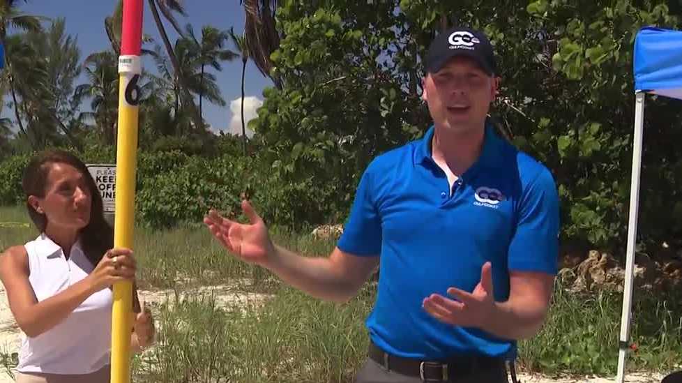 Meteorologist Rob Duns demonstrates storm surge flooding in Naples ...