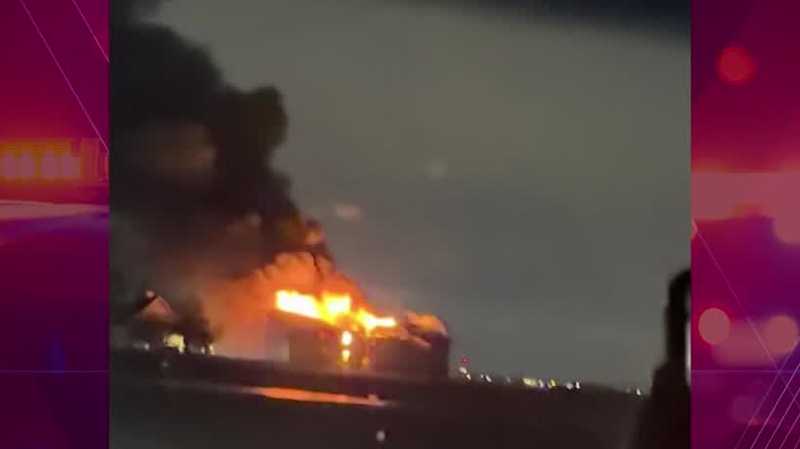 Two injured in large structure fire in Bondurant