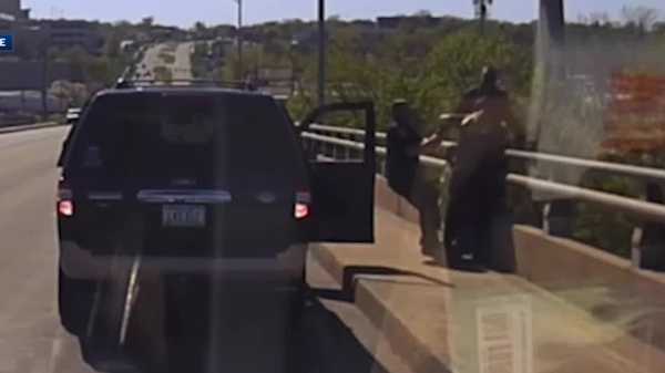 video captures des moines police officers stopping man from jumping off bridge