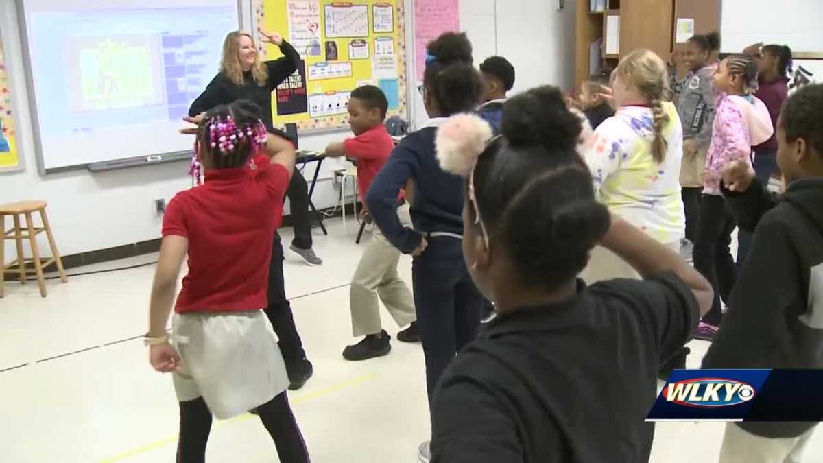 Louisville elementary teacher educates students through song, dance