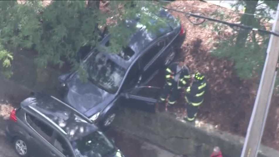 Driver's car pushes other vehicle over retaining wall into Route 9 in ...