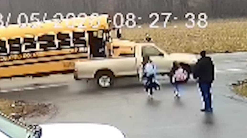 Dramatic video shows truck drive around bus, nearly hit 2 Maryland girls