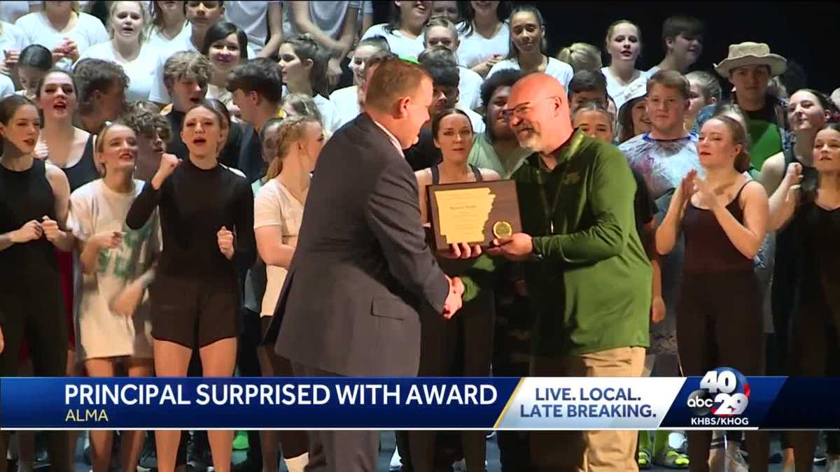 Alma Middle School Principal surprised with award
