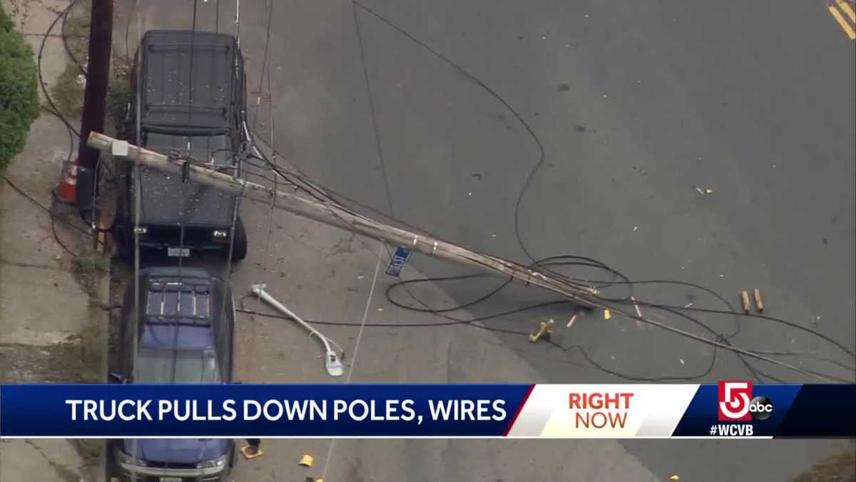 Truck pulls down poles, wires in Lynn