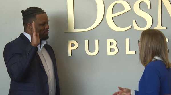 new dmps school board member sworn in