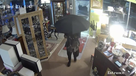 Man carrying umbrella jewelry theft Naples