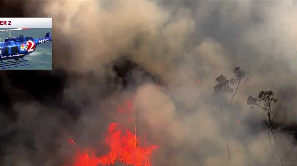 PHOTOS: Firefighters work to contain brush fire in Marion County
