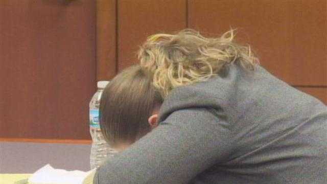 Mother accused of leaving son in hot car breaks down in court